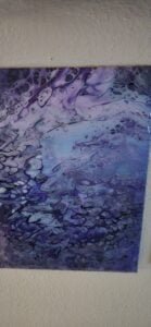 a painting of a blue and purple liquid
